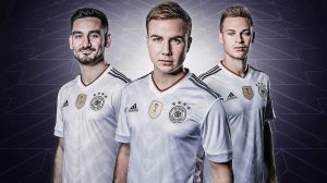 The new Trikot for the 2017 Confed Cup, modelled by İlkay Gündoğan, Mario Götze and Joshua Kimmich